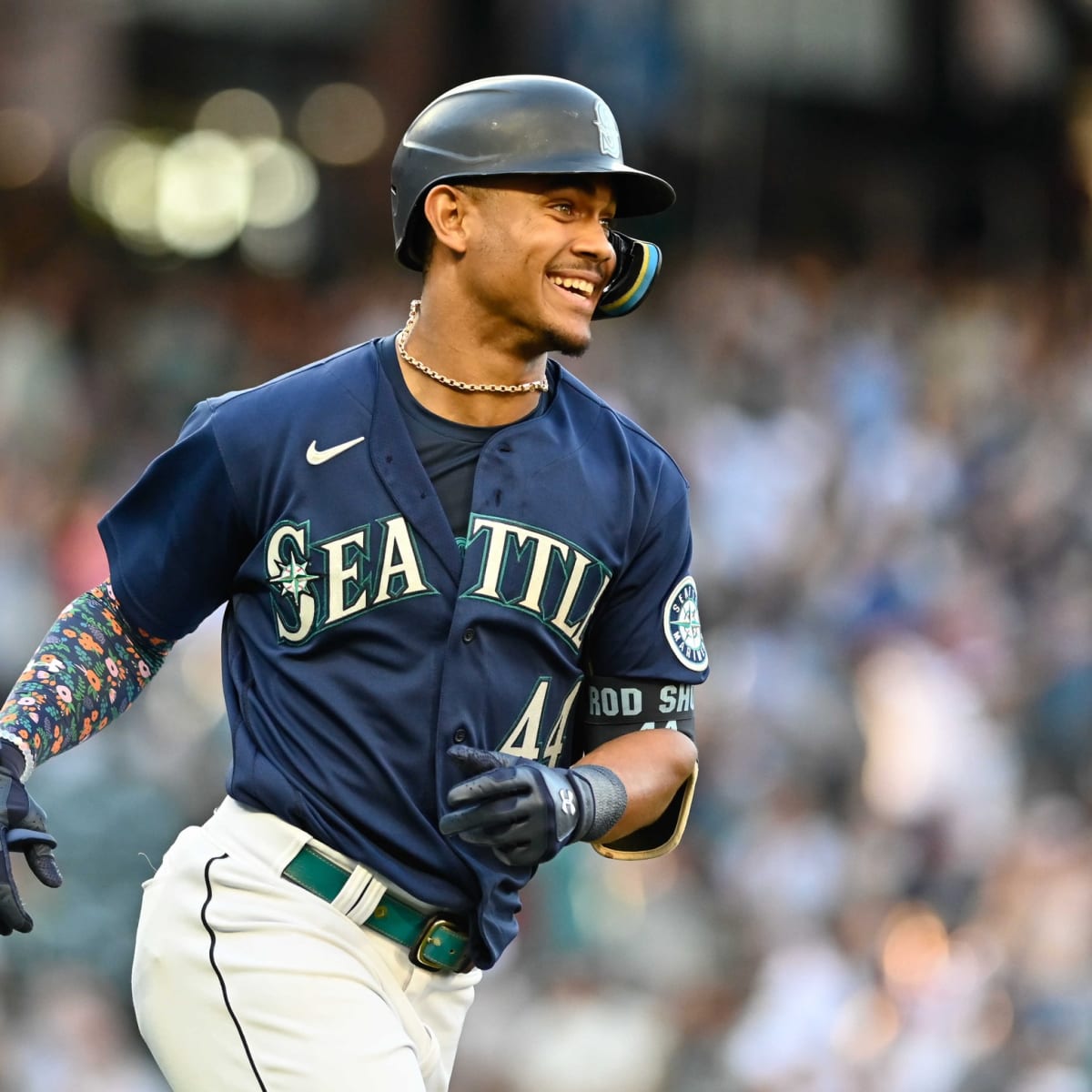 American League's Julio Rodriguez, of the Seattle Mariners, smiles