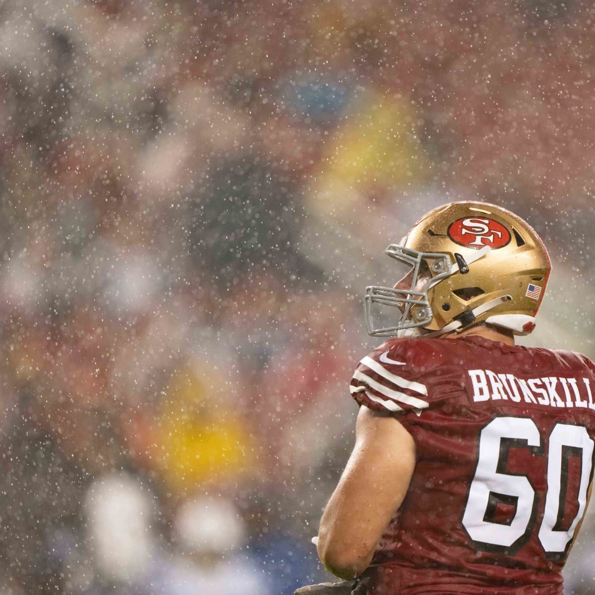 San Francisco 49ers guard Daniel Brunskill (60) spikes the ball