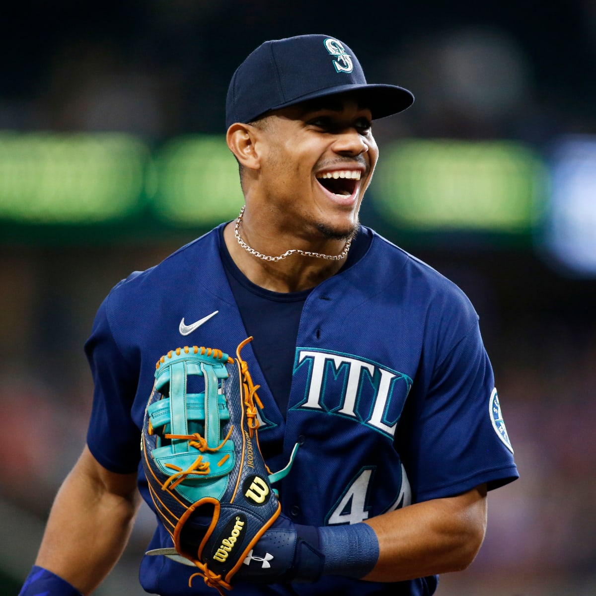American League's Julio Rodriguez, of the Seattle Mariners, smiles