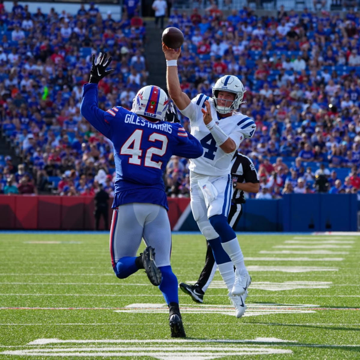 August 24, 2019: Indianapolis Colts linebacker Ben Banogu (52) and Chicago  Bears offensive lineman T.J. Clemmings (79) battle at the line of scrimmage  during NFL football preseason game action between the Chicago