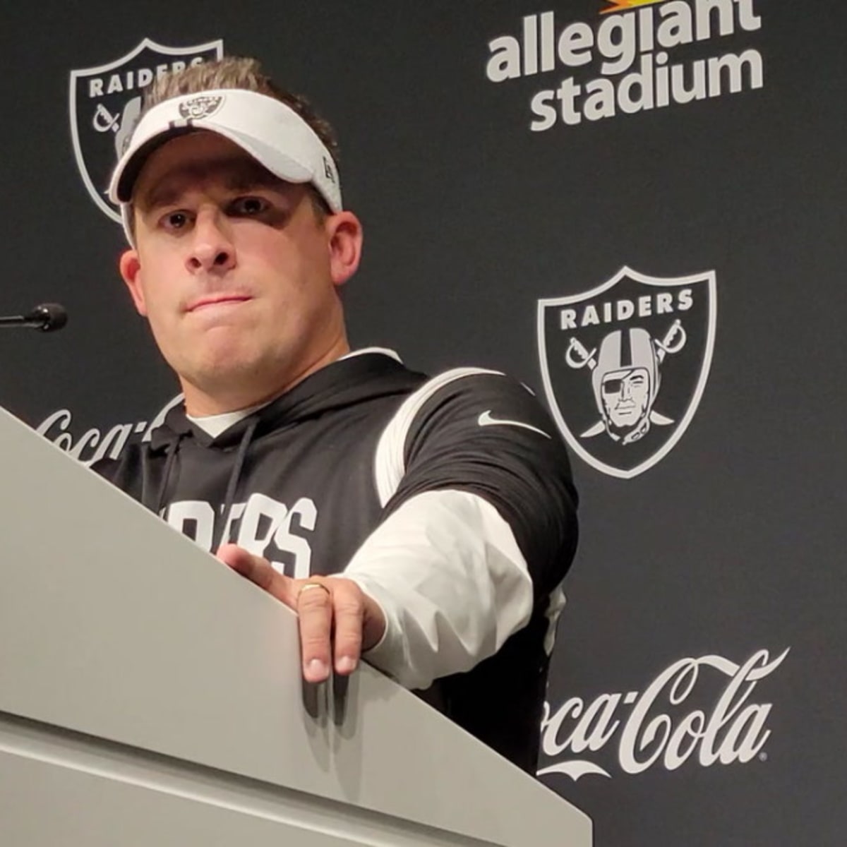 Head Coach Josh McDaniels talks to the media postgame