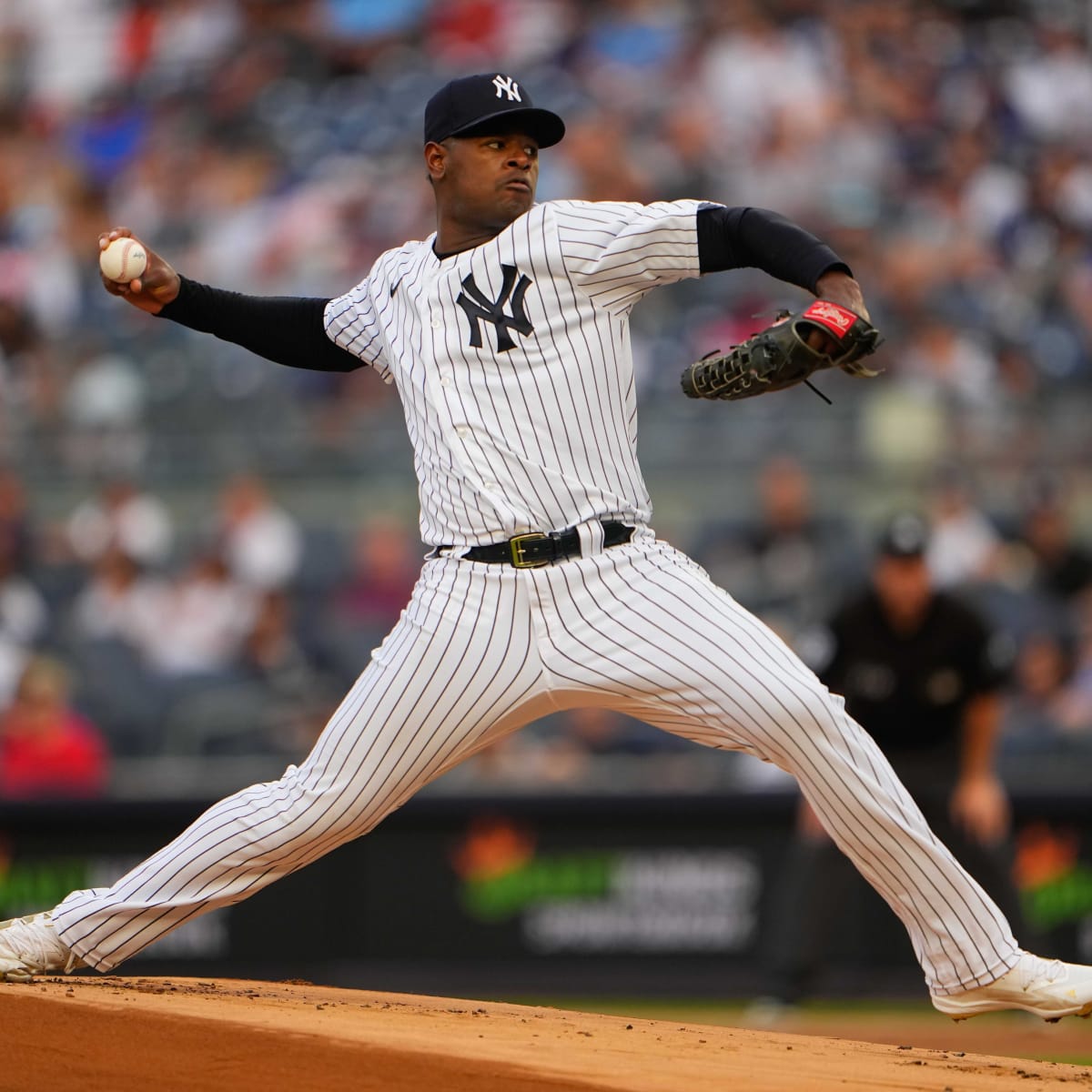 Yankees starting pitcher Luis Severino walks off the field to a standing  ovation