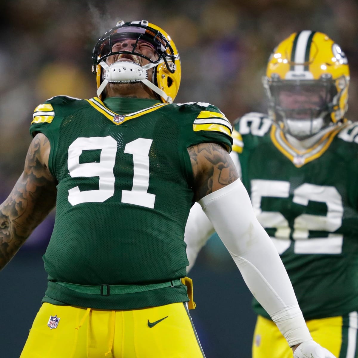 Green Bay Packers linebacker Kingsley Enagbare (55) lines up for the play  during a preseason NFL football game against the Cincinnati Bengals on  Friday, Aug. 11, 2023, in Cincinnati. (AP Photo/Emilee Chinn