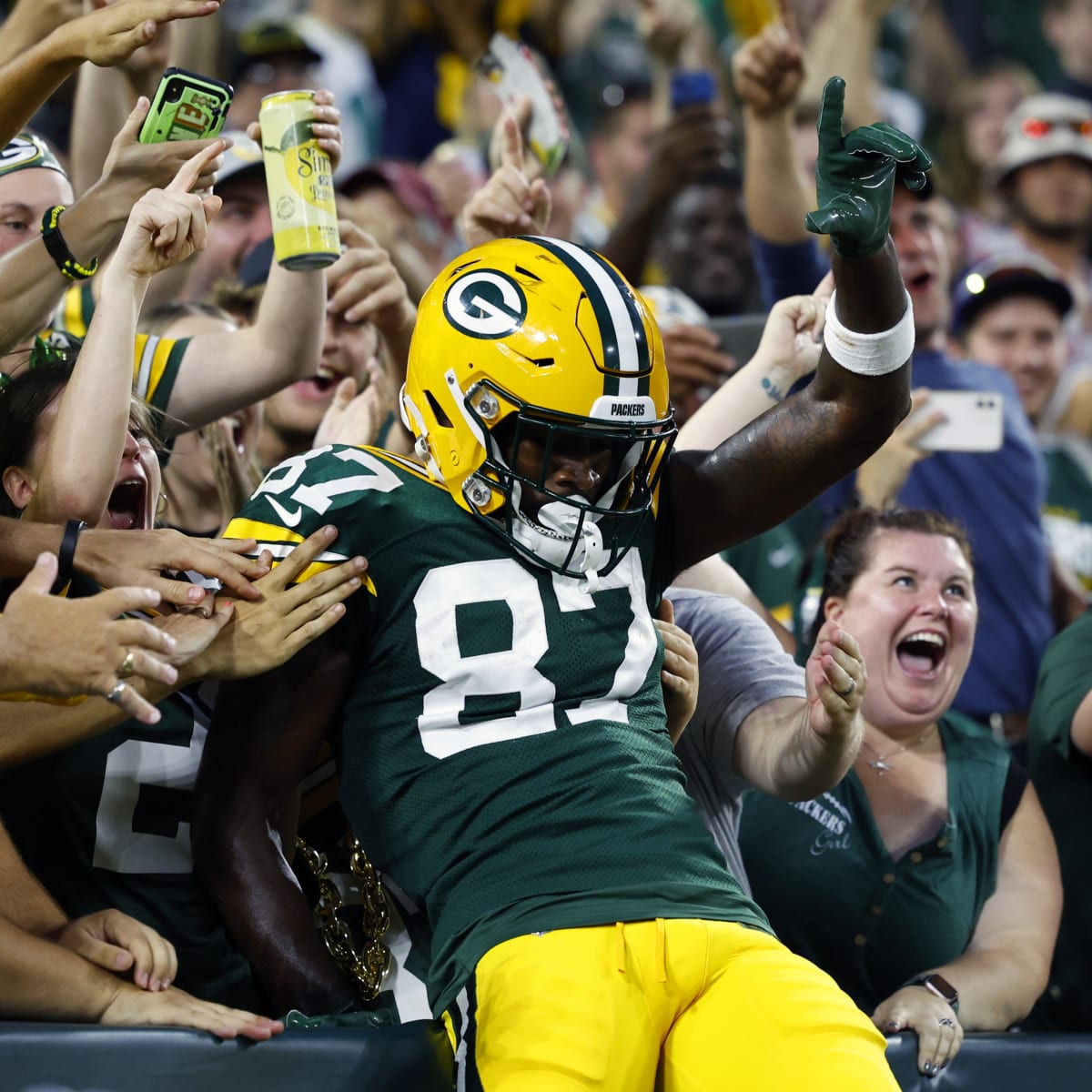 Green Bay Packers quarterback Danny Etling (19) runs for a touchdown during  an NFL Preseason game against the New Orleans Saints Friday, Aug. 19, 2022,  in Green Bay, Wis. (AP Photo/Jeffrey Phelps