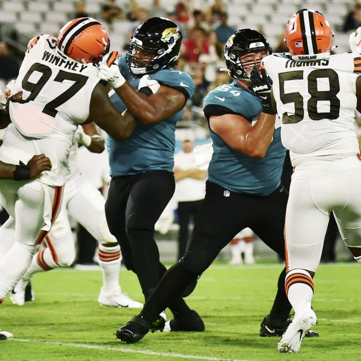 Cleveland Browns defensive end Isaiah Thomas (58) lines up for a