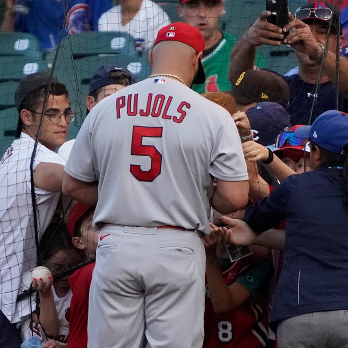 Albert Pujols gives 9yo with Down syndrome shirt off his back :  r/HumansBeingBros