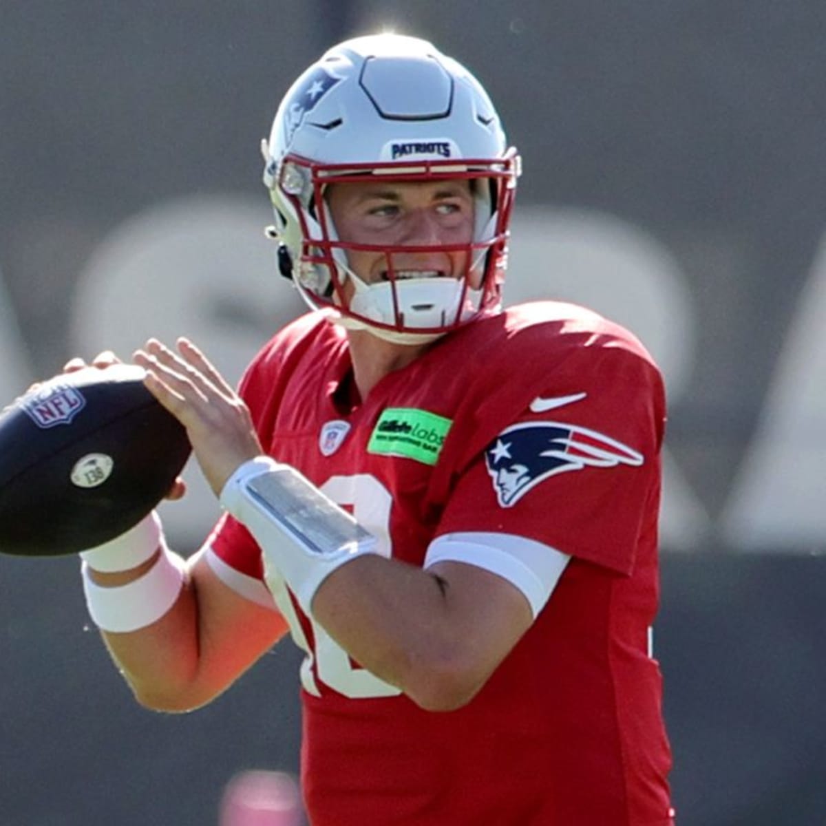 New England Patriots quarterback Brian Hoyer (5) tosses the ball during the  first half of an NFL preseason football game against the Las Vegas Raiders,  Friday, Aug. 26, 2022, in Las Vegas. (