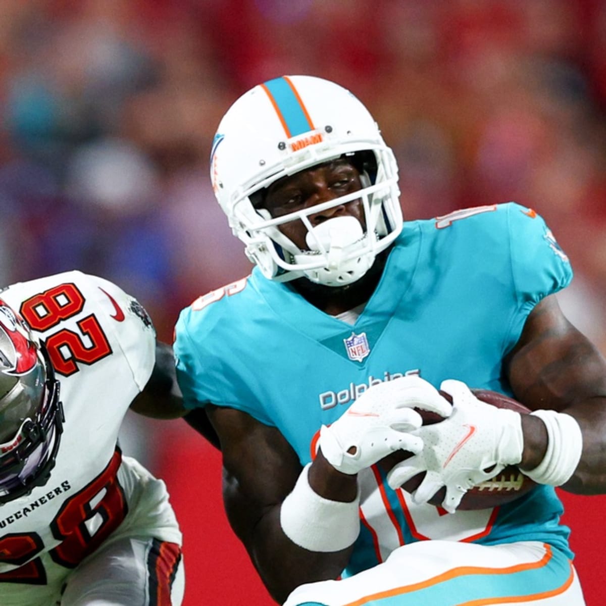 Miami Dolphins wide receiver Mohamed Sanu (16) is shown during a timeout in  the first half of a NFL preseason football game against the Philadelphia  Eagles, Saturday, Aug. 27, 2022, in Miami