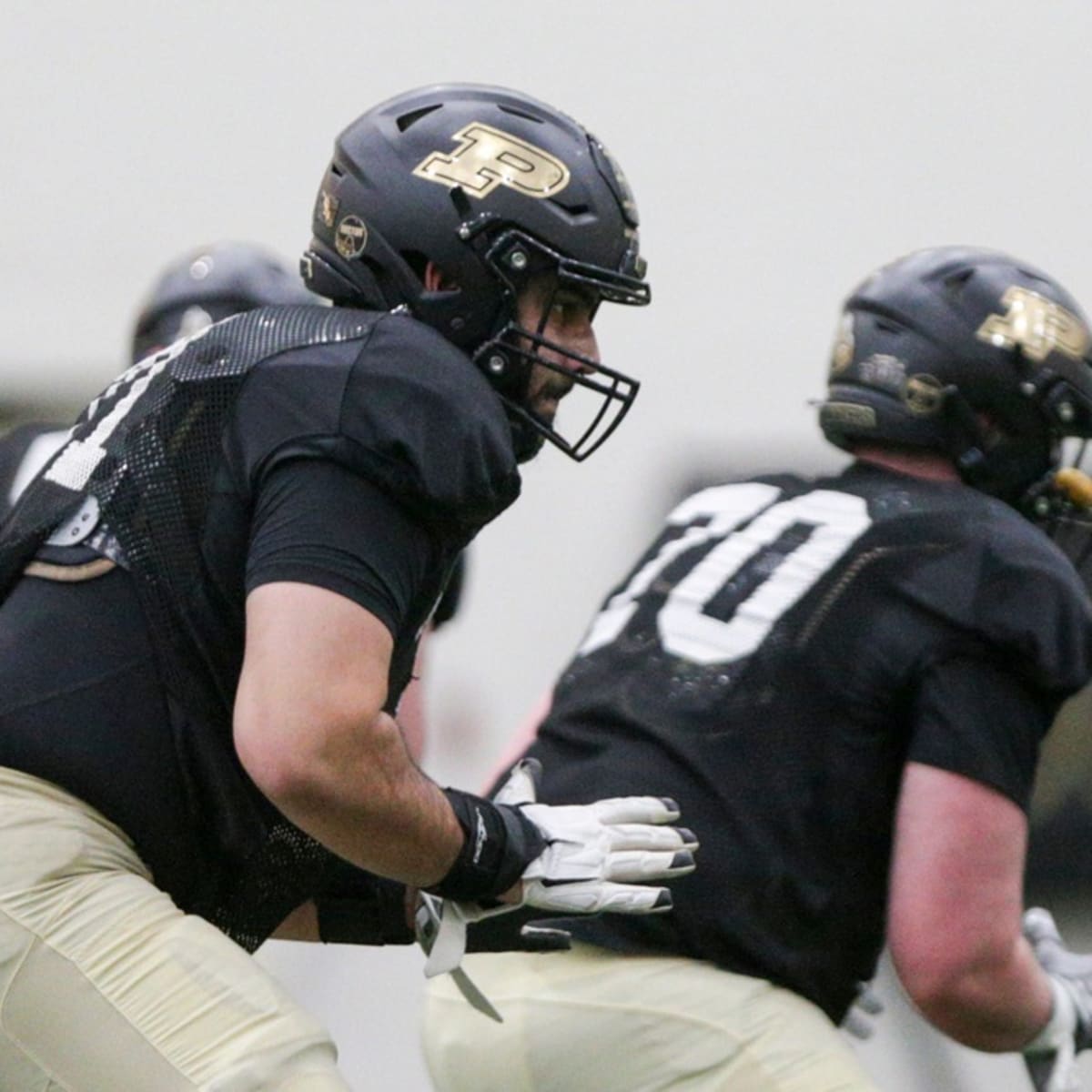 Study: Football offensive linemen should start plays upright to avoid hits  to the head - Purdue University News