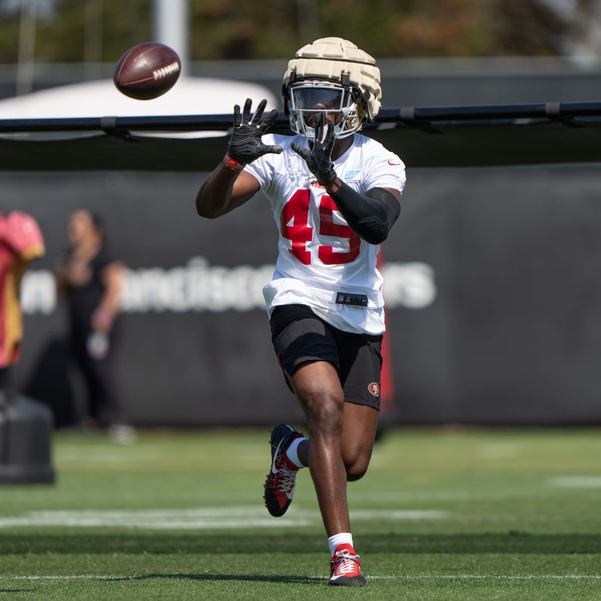 San Francisco 49ers linebacker Segun Olubi (49) looks on during