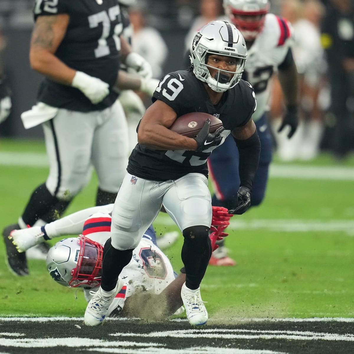 Las Vegas Raiders wide receiver DJ Turner (19) catches a pass during NFL  football training camp Saturday, July 30, 2022, in Henderson, Nev. (AP  Photo/Steve Marcus Stock Photo - Alamy