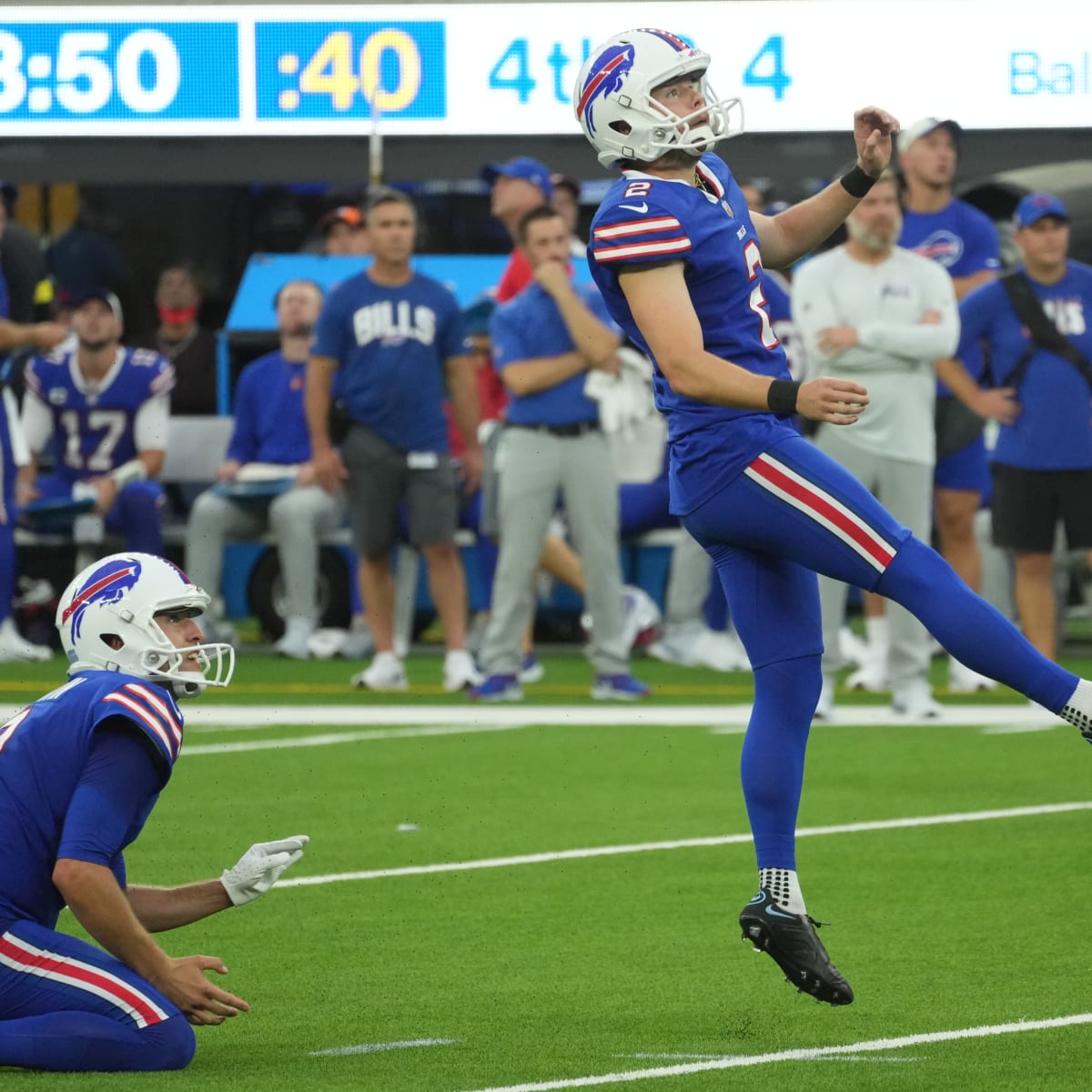 Buffalo Bills place kicker Tyler Bass (2) kicks a PAT during the first half  of an NFL football game against the New England Patriots on Sunday, Jan. 8,  2023, in Orchard Park