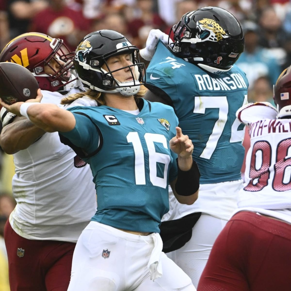 September 11th 2022: Jacksonville Jaguars quarterback Trevor Lawrence (16)  drops back to pass during the NFL game between the Jacksonville Jaguars and  the Washington Commanders at FedEx Field in Landover, MD. Reggie