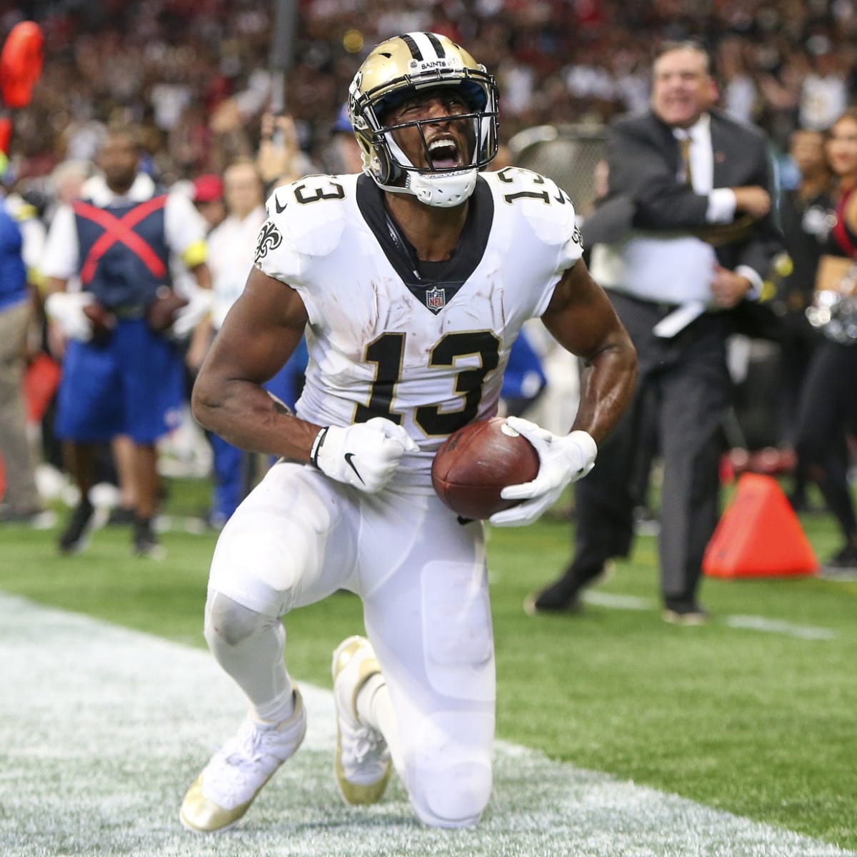 New Orleans Saints wide receiver Michael Thomas (13) celebrates a touchdown  with tight end Juwan Johnson (83) during the second half of an NFL football  game against the Atlanta Falcons, Sunday, Sep.