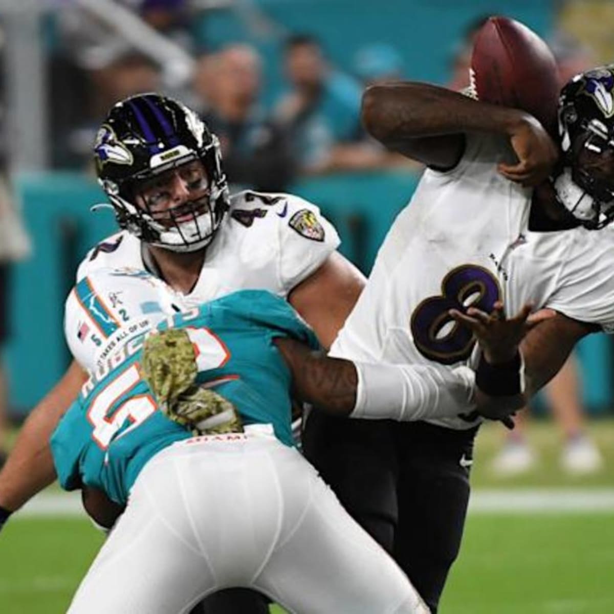 Lamar Jackson leads Ravens' offense in rout of Dolphins - Sports Illustrated