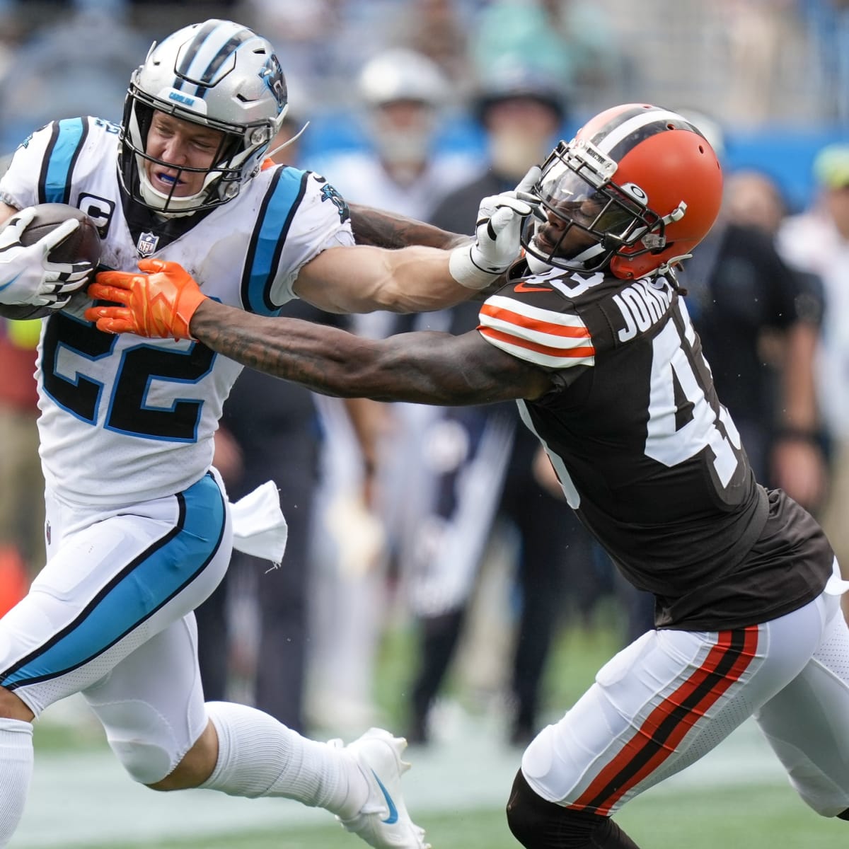 Carolina Panthers running back Chuba Hubbard (30) takes a handoff