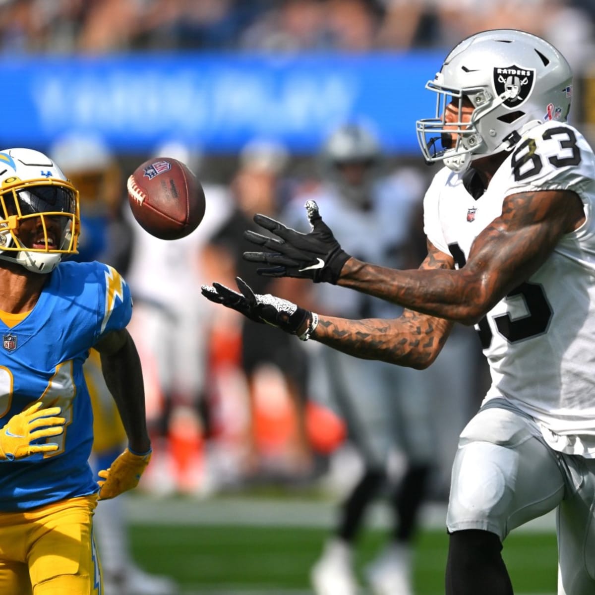 Las Vegas Raiders tight end Darren Waller (83) is tackled by