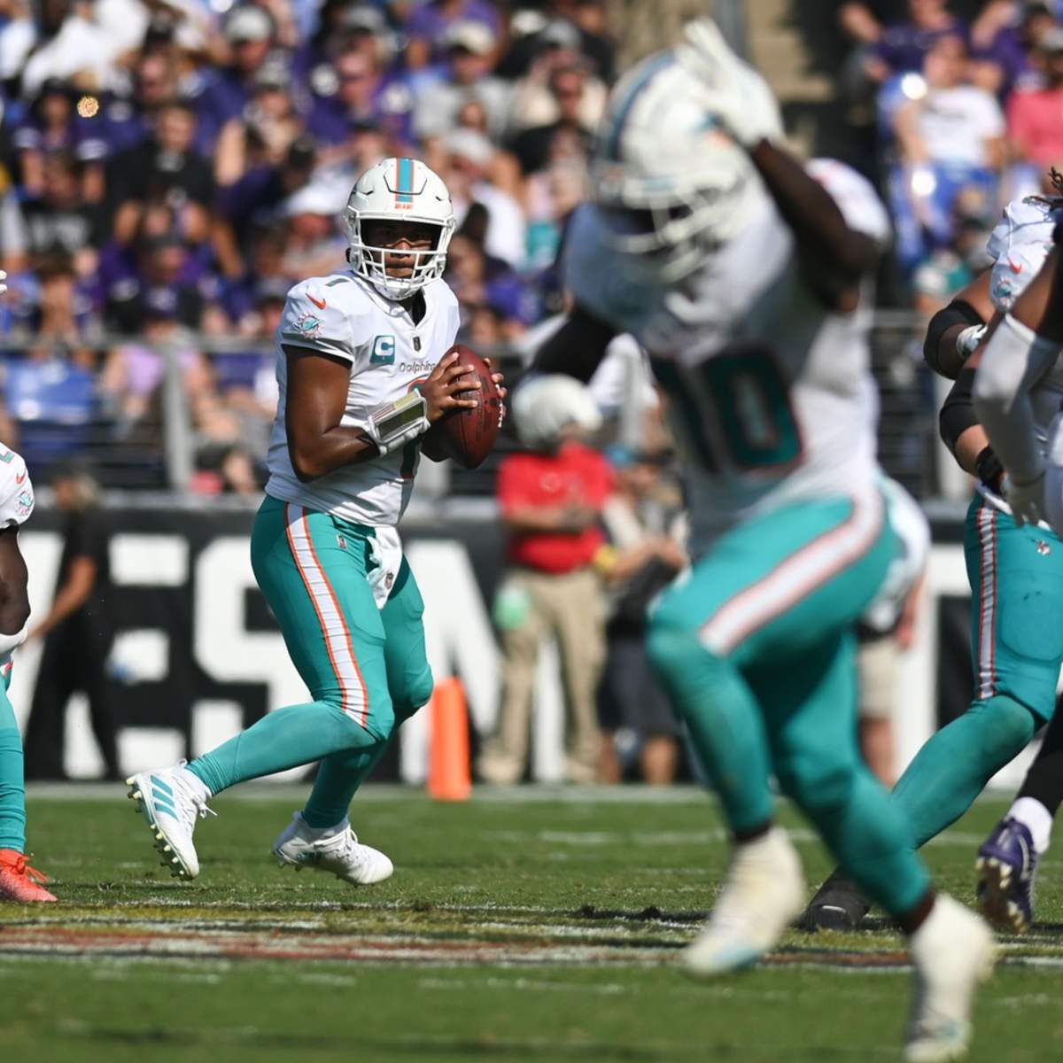 Dolphins engineer historic 70-20 win, improve to 3-0 - Caplin News