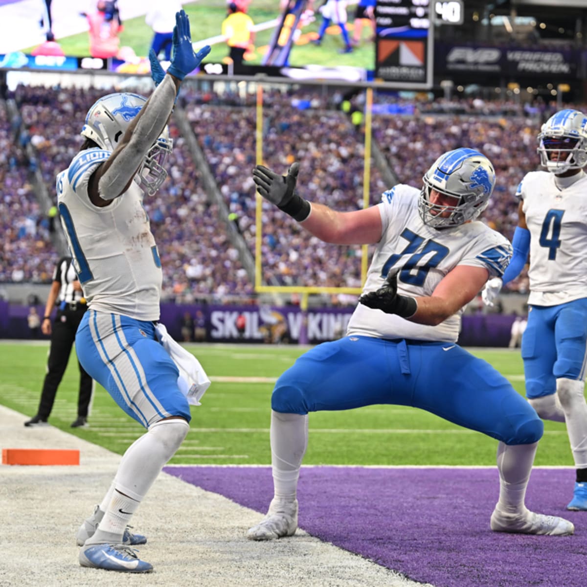 Detroit Lions running back Jamaal Williams runs with teh ball during an NFL  football game against the Seattle Seahawks, Sunday, Jan. 2, 2022, in  Seattle. The Seahawks won 51-29. (AP Photo/Stephen Brashear