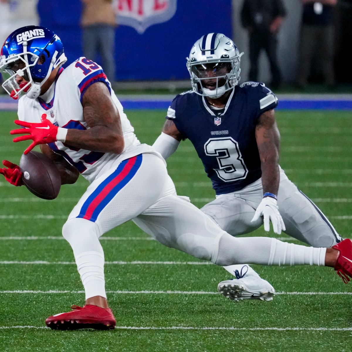 Chicago Bears wide receiver Byron Pringle (13) pulls the ball away from New  York Jets cornerback D.J. Reed (4) for a touchdown catch during the first  quarter of an NFL football game