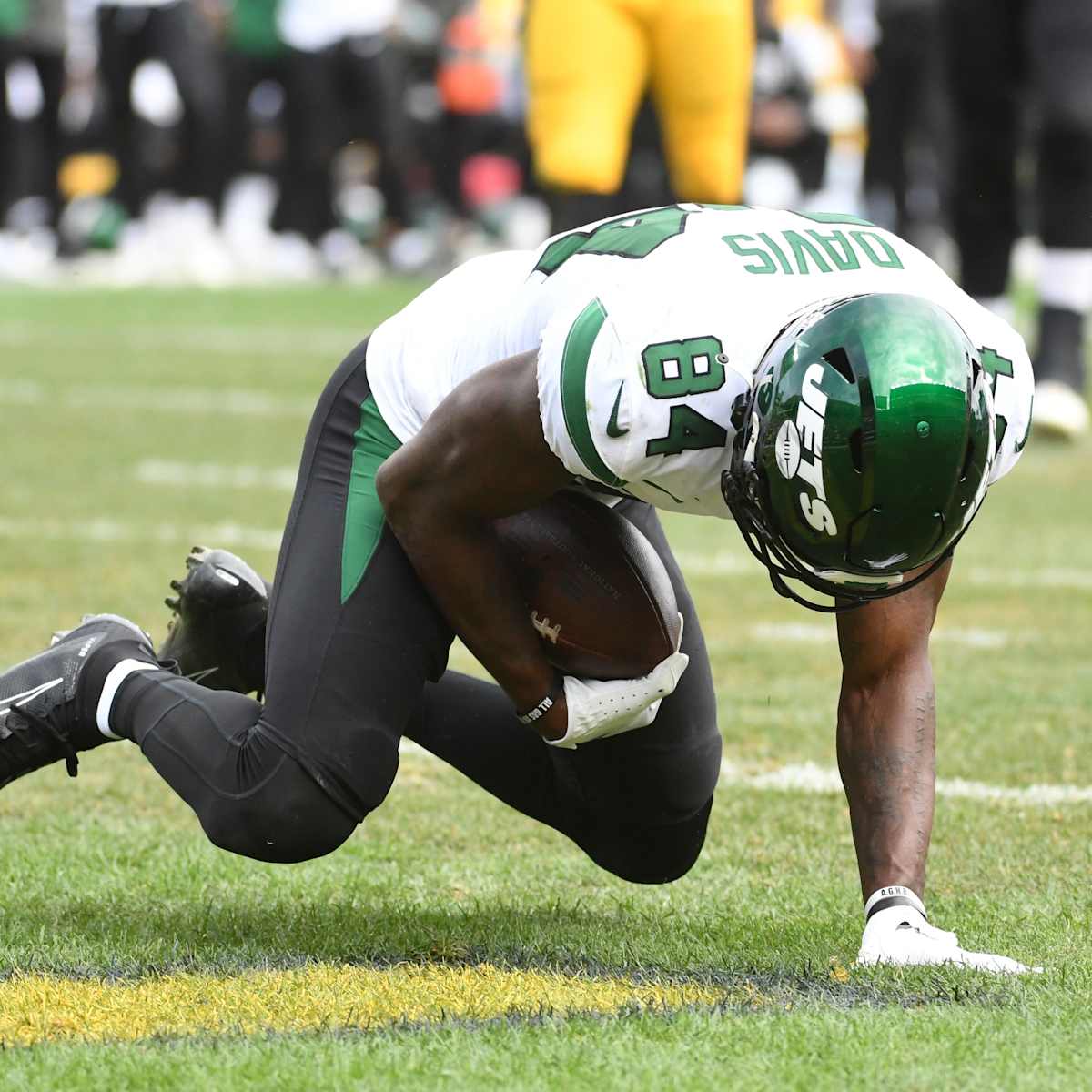 New York Jets wide receiver Corey Davis (84) celebrates after scoring a  touchdown against Tenne …