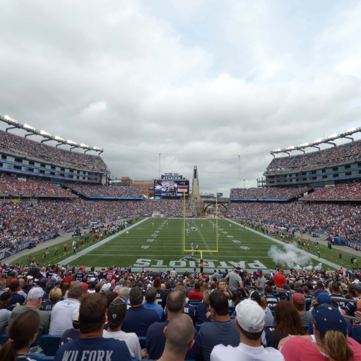 The New England Patriots, wearing their throwback uniforms, and the Detroit  Lions line up for the snap at the line of scrimmage during an NFL football  game at Gillette Stadium, Sunday, Oct.