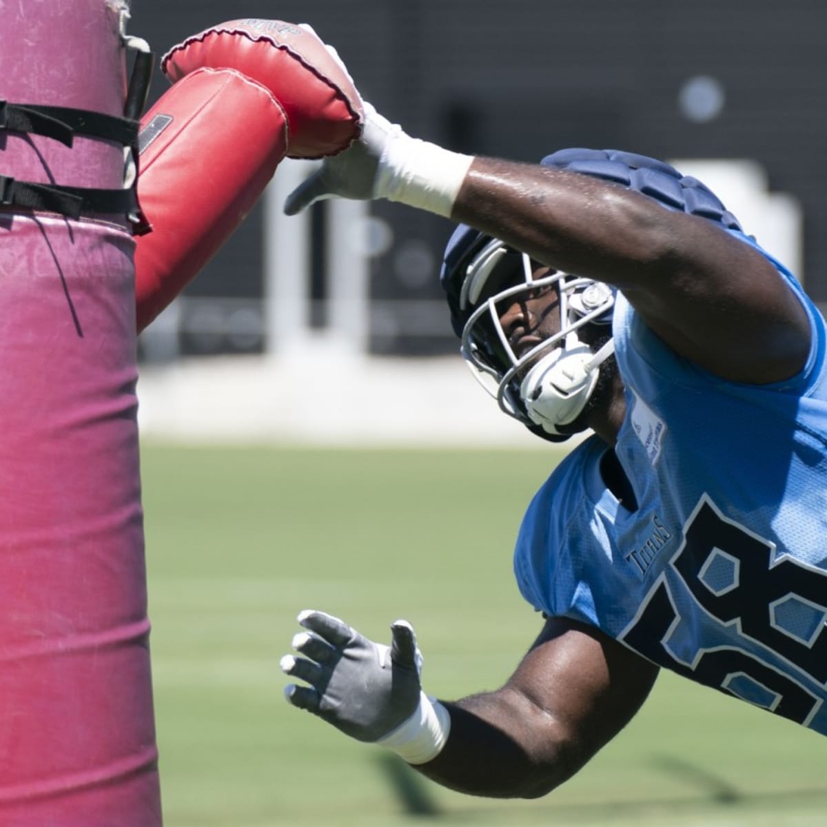 Tennessee Titans defensive tackle Sam Okuayinonu (59) runs during