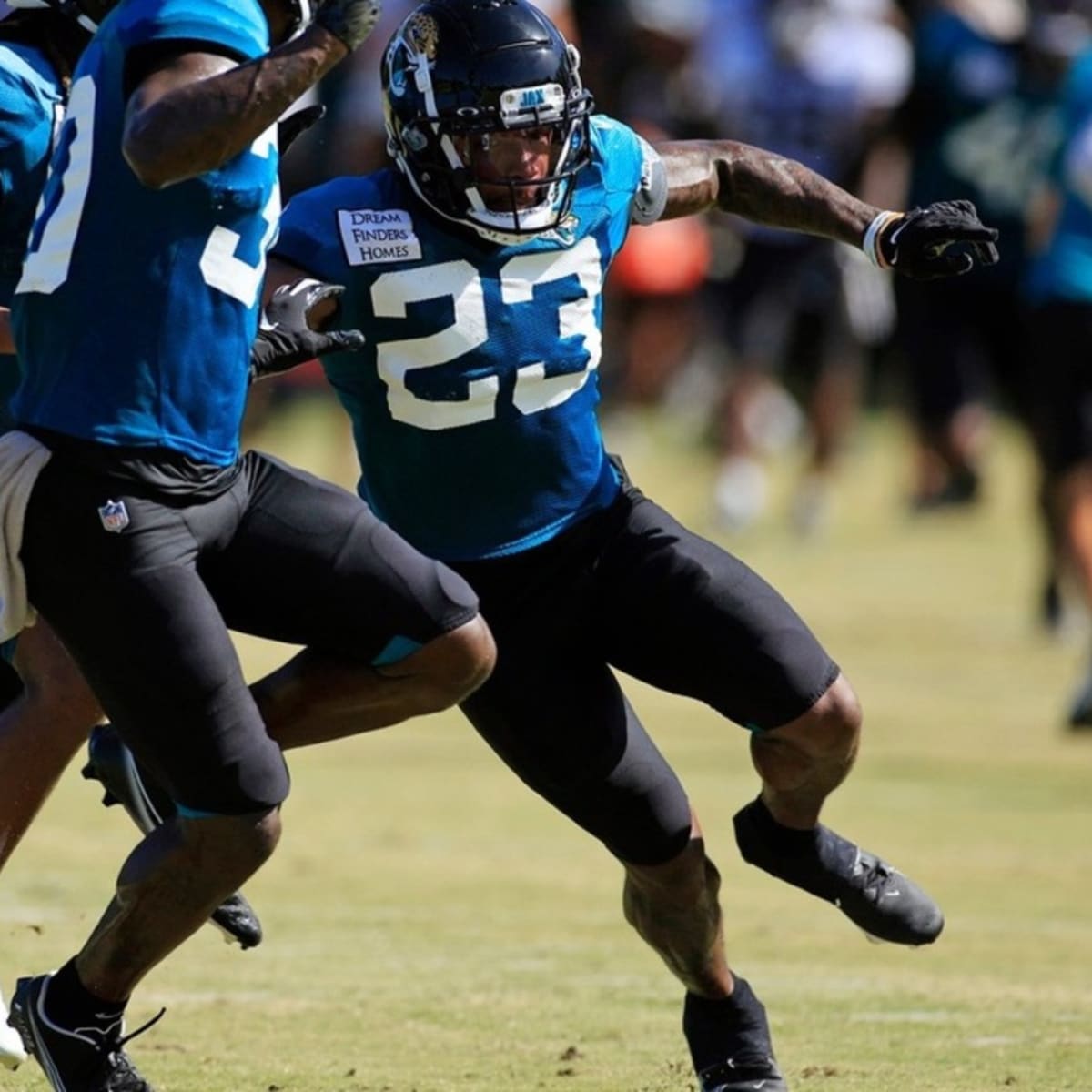 Tennessee Titans safety Josh Thompson (29) comes onto the field