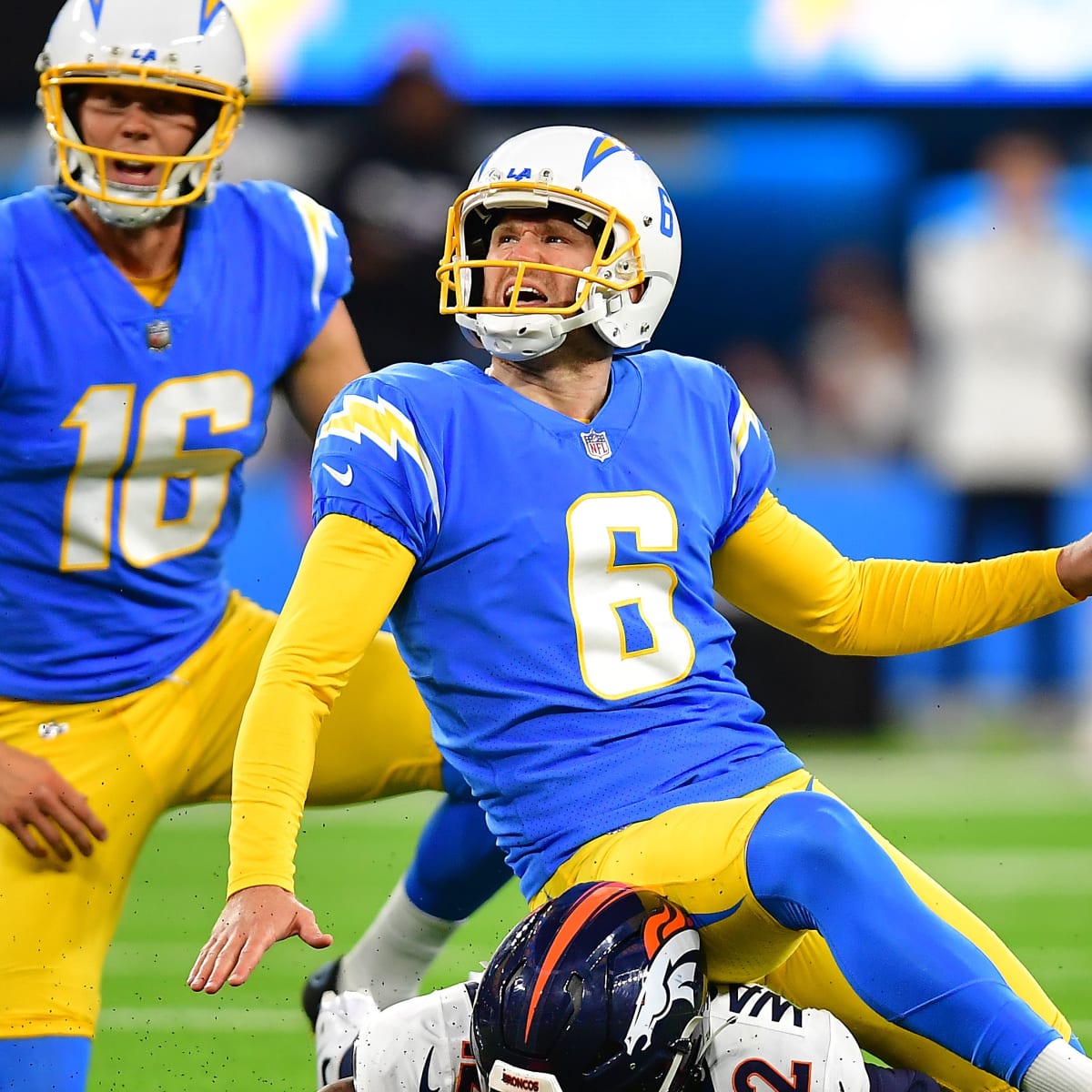 Injured Hopkins kicks OT game-winner as Chargers beat stumbling