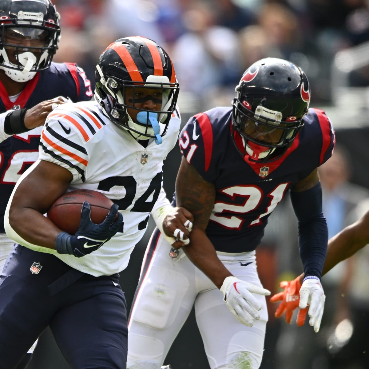 December 24, 2022 - Chicago Bears running back Khalil Herbert (24) fends  off a tackle attempt during