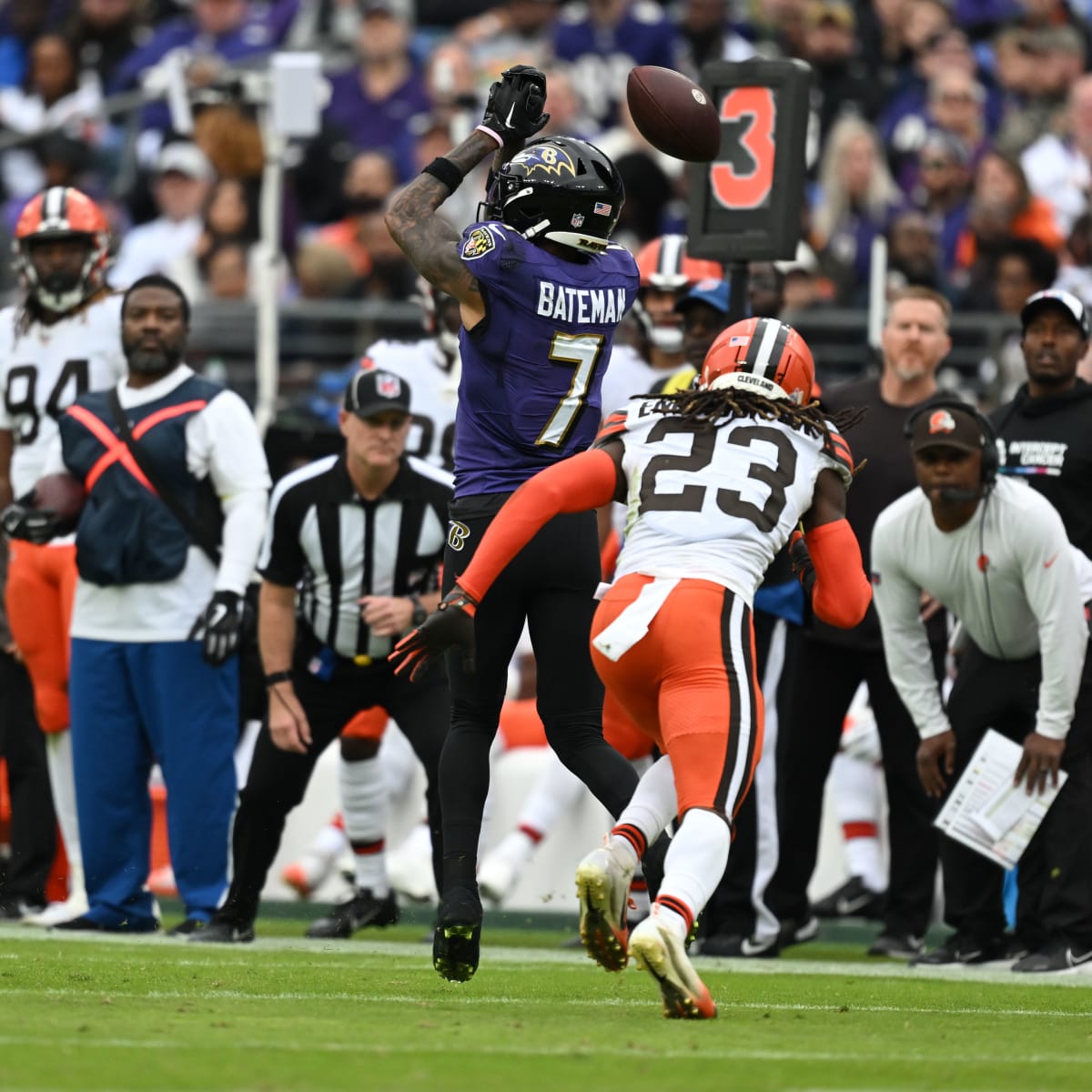 Baltimore Ravens wide receiver Rashod Bateman (7) throws around a rugby  ball om the sidelines during the second half of an NFL football game  against the Cleveland Browns, Sunday, Oct. 23, 2022