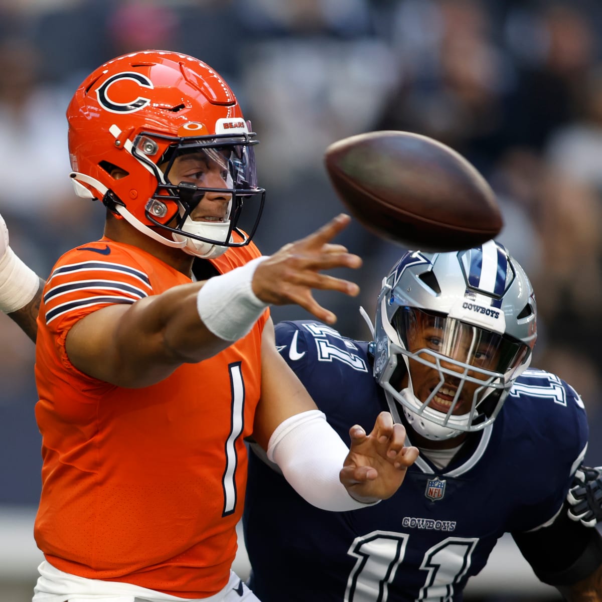 Dallas Cowboys linebacker Micah Parsons (11) and Leighton Vander Esch (55)  huddle with other defensive player during a Thanksgiving day NFL football  game against the Las Vegas Raiders, Thursday, Nov. 25, 2021