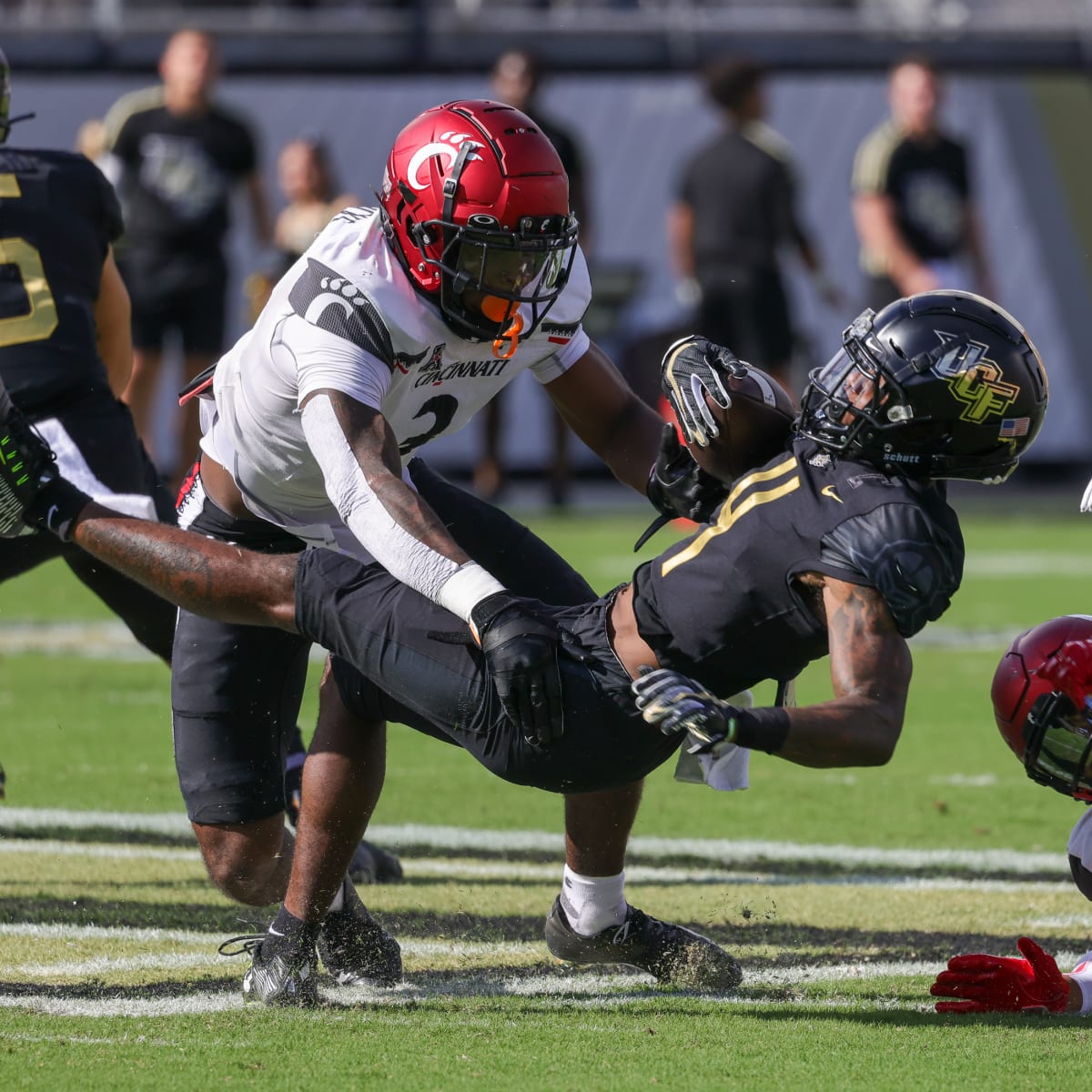 WATCH: UC football Day 1 training camp takes at Nippert Stadium