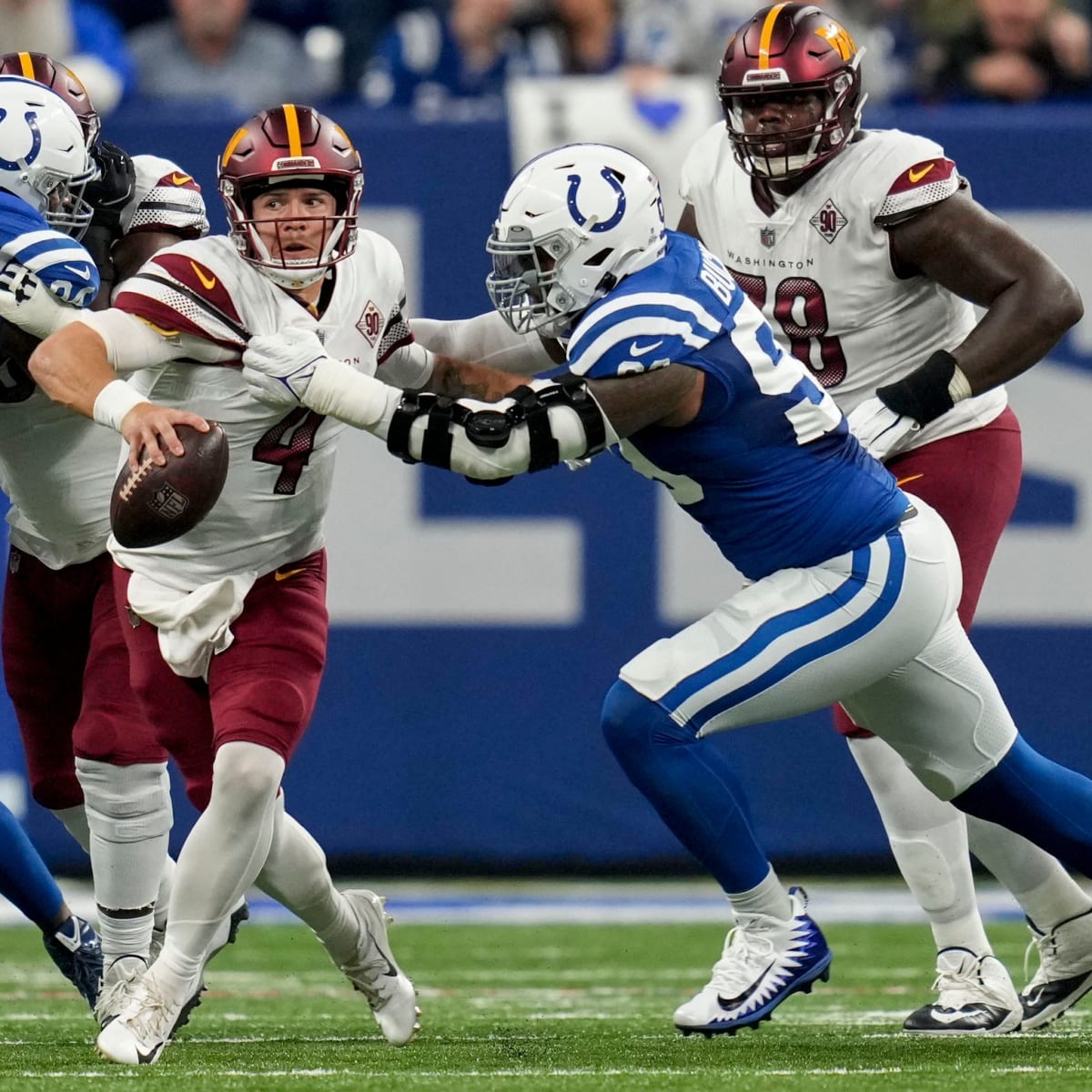 INDIANAPOLIS, IN - OCTOBER 30: Washington Commanders quarterback Taylor  Heinicke (4) looks down field for a receiver during an NFL game between the  Washington Commanders and the Indianapolis Colts on October 30