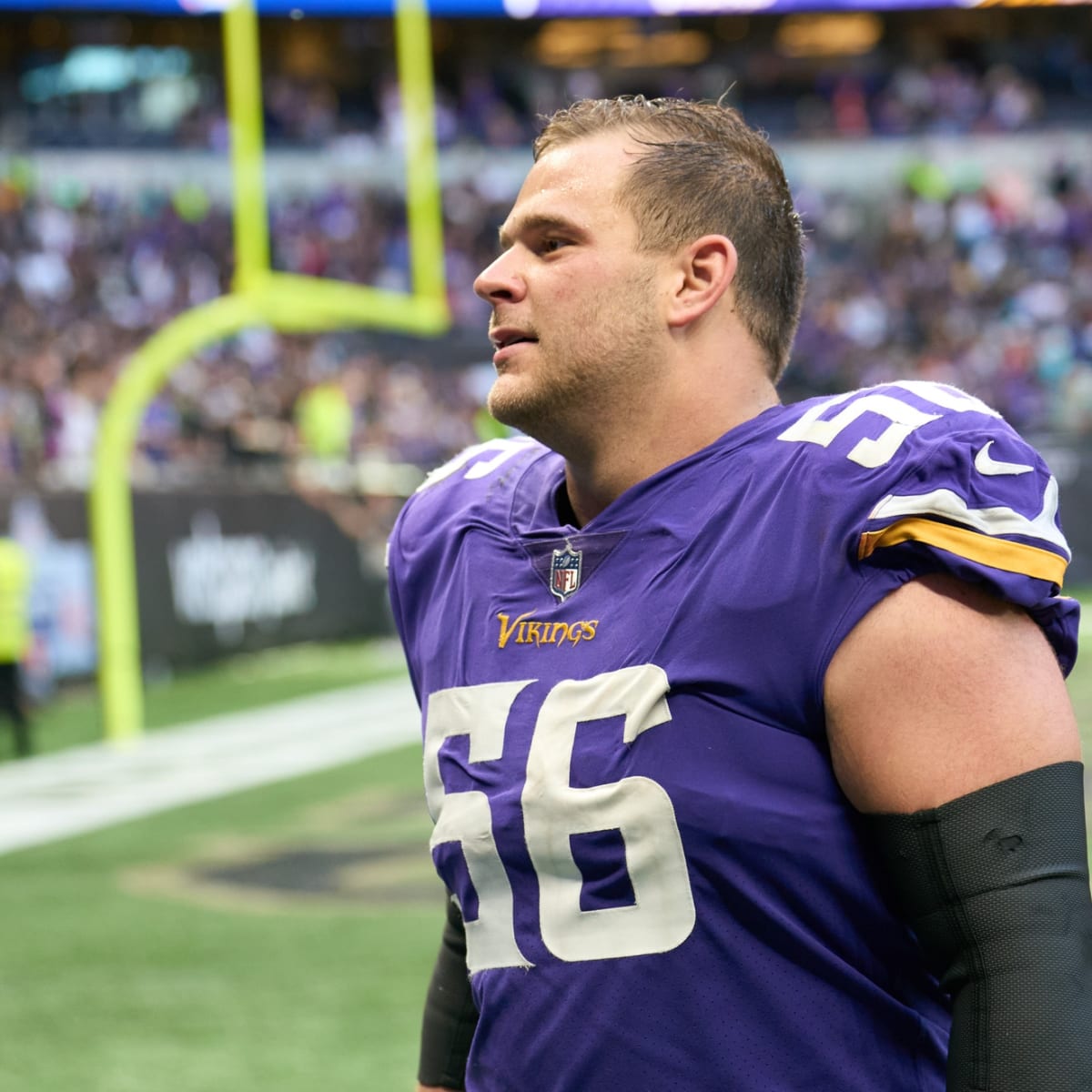 Minnesota Vikings center Garrett Bradbury (56) runs off the field