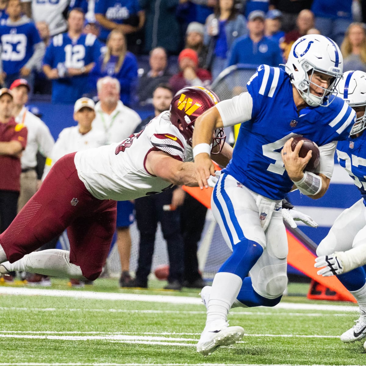 Indianapolis Colts quarterback Sam Ehlinger (4) plays against the New  England Patriots in the second half of an NFL football game, Sunday, Nov.  6, 2022, in Foxborough, Mass. (AP Photo/Michael Dwyer Stock