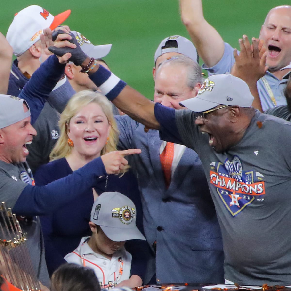 Astros Players Swarm Dusty Baker After He Captures First World Series Title  - Sports Illustrated