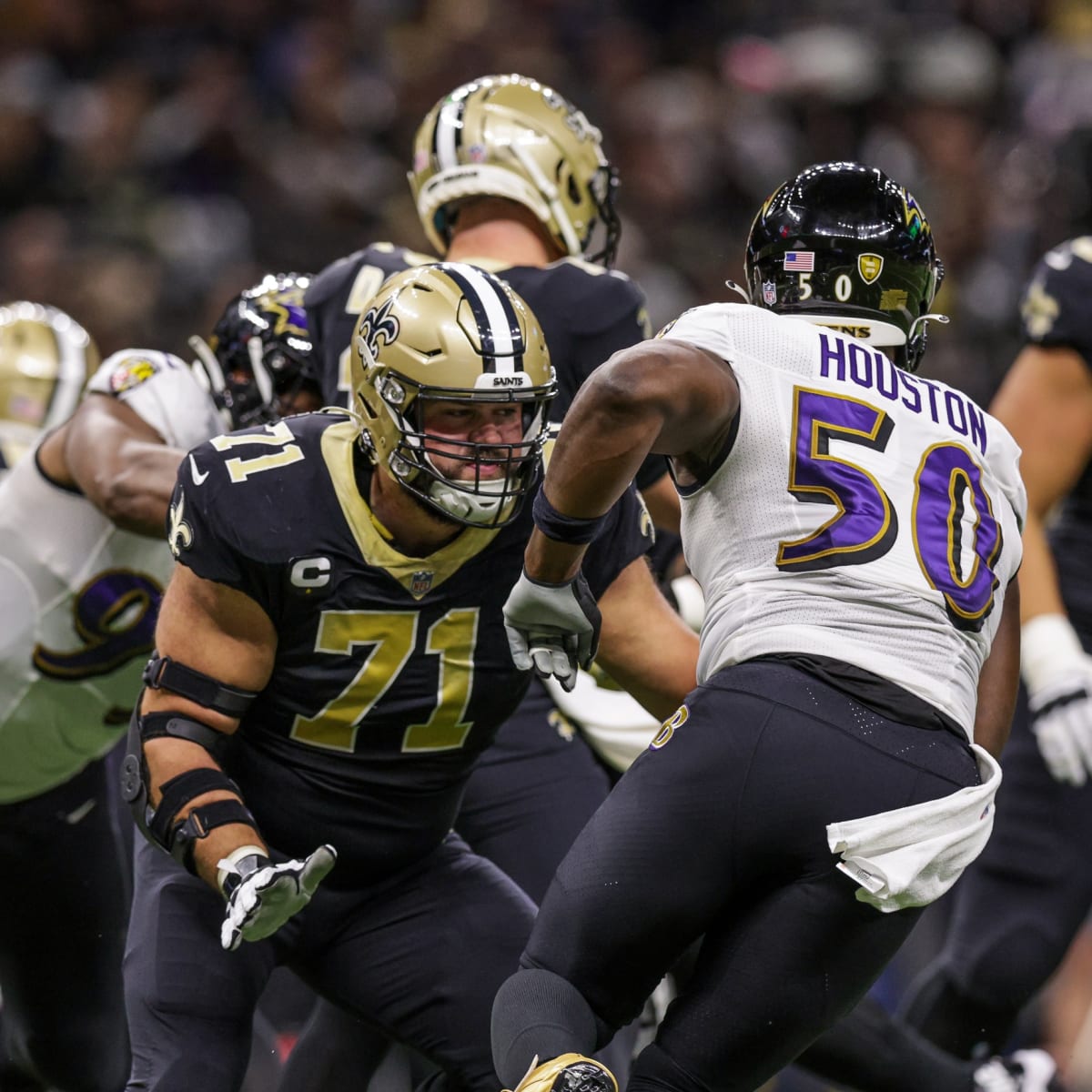 New Orleans, Louisiana,, November 7, 2022. New Orleans Saints safety Tyrann  Mathieu (32) tackles Baltimore Ravens quarterback Lamar Jackson (8) during  a National Football League game at Caesars Superdome in New Orleans