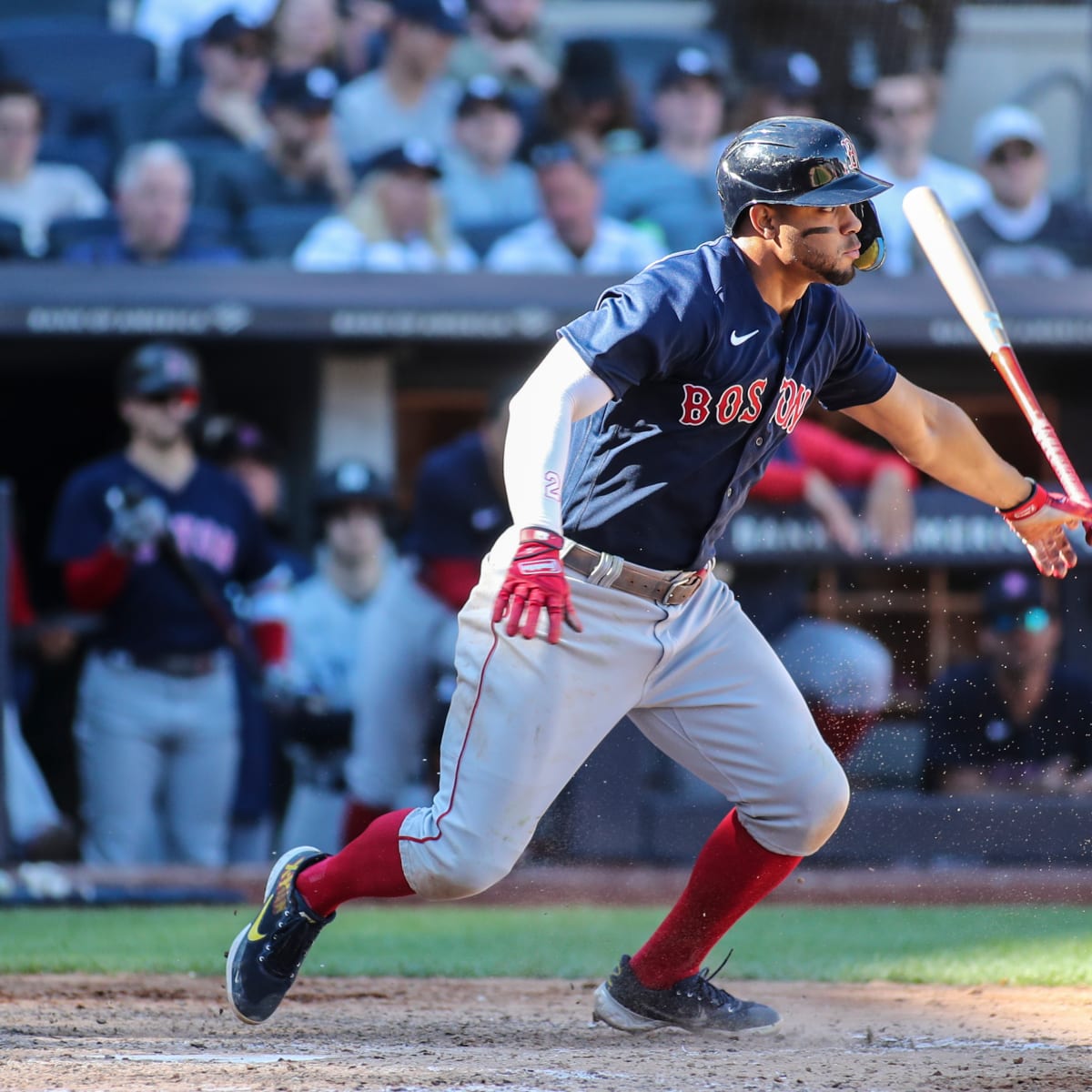 Xander Bogaerts of the Boston Red Sox warms up as he wears the