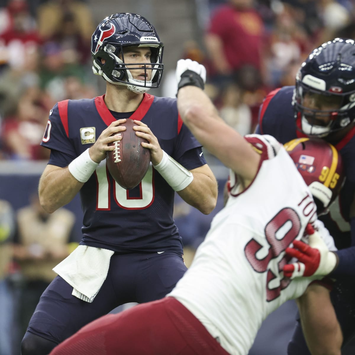 Houston, TX, USA. 9th Jan, 2022. Houston Texans quarterback Davis Mills  (10) prepares for a play during the 1st quarter of an NFL football game  between the Tennessee Titans and the Houston