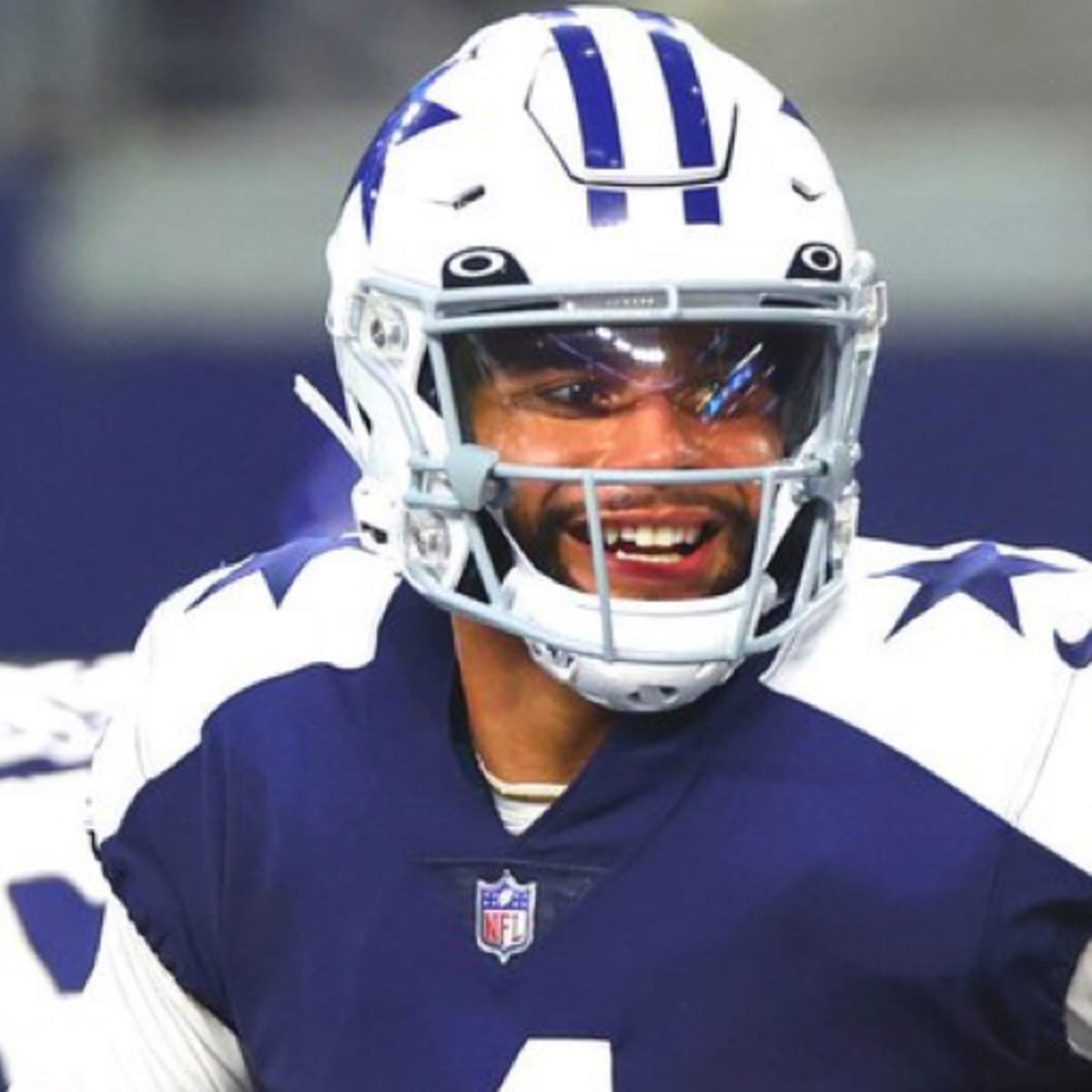 Quarterback (4) Dak Prescott of the Dallas Cowboys turns to hand off  against the Los Angeles Chargers in an NFL football game, Sunday, Sept. 19,  2021, in Inglewood, Calif. The Cowboys defeated