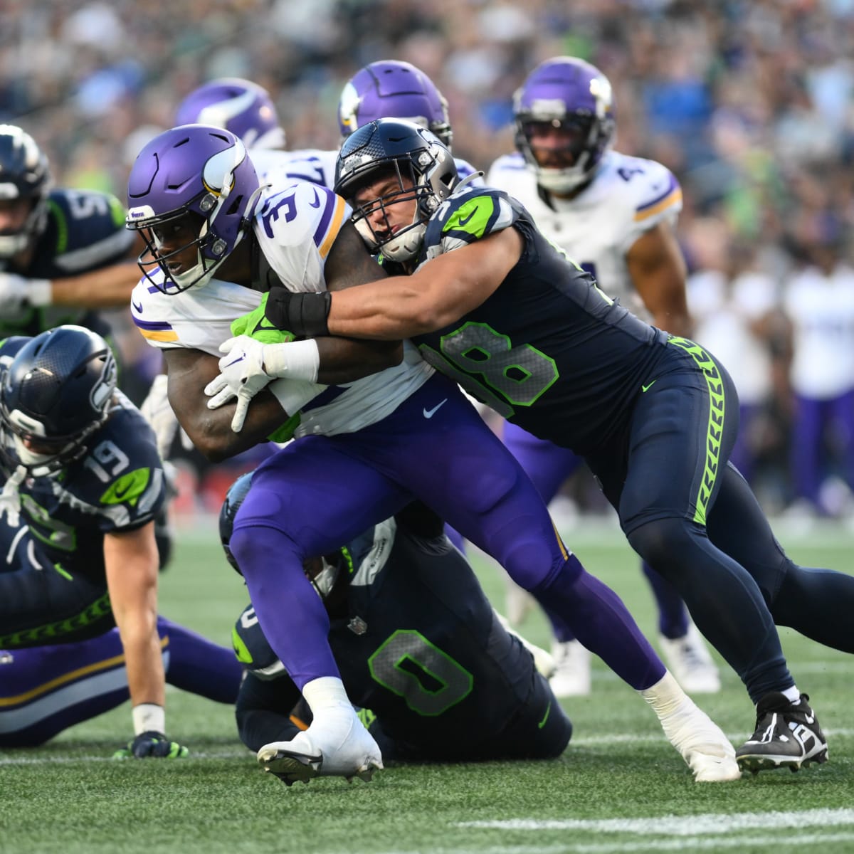 Seattle Seahawks linebacker Levi Bell (98) runs down the field during an  NFL pre-season football game against the Minnesota Vikings, Thursday, Aug.  10, 2023 in Seattle. (AP Photo/Ben VanHouten Stock Photo - Alamy