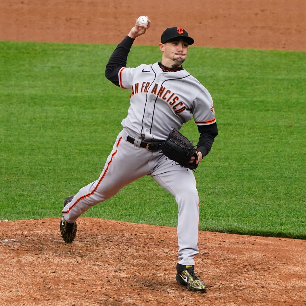 Former A's pitchers hope to give Giants' black and orange a green