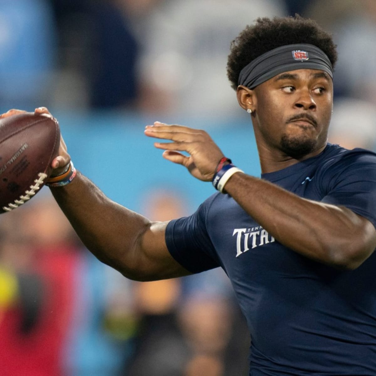 Tennessee Titans quarterback Malik Willis locates wide receiver Chris Moore  on first pass of the day for 30-yard gain