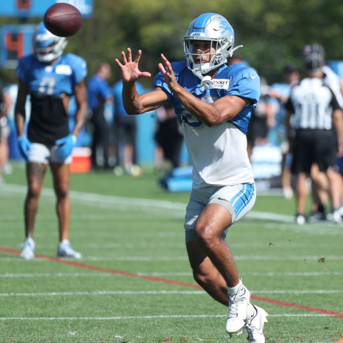 Detroit Lions running back Devine Ozigbo (30) watches from the