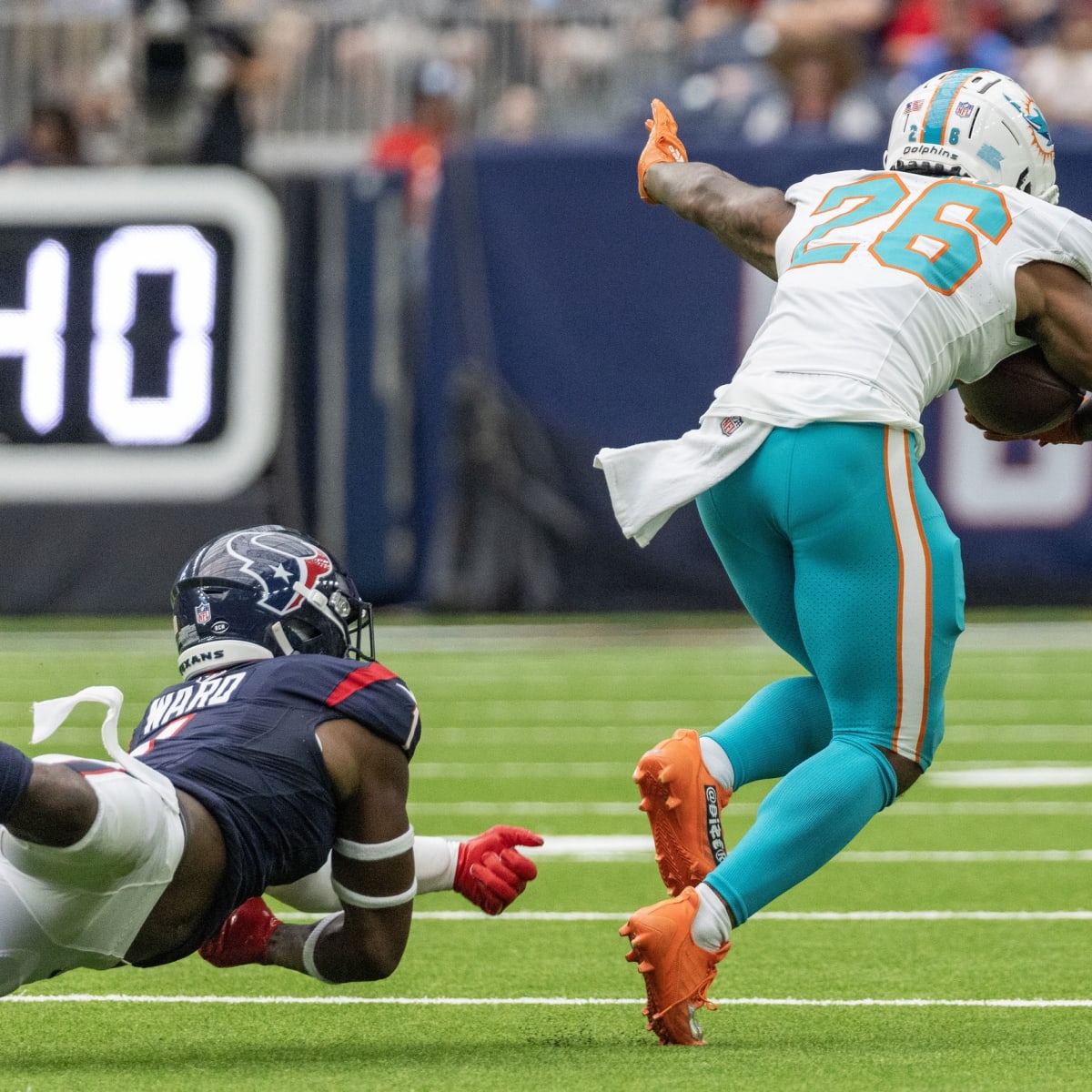 August 19, 2023: Miami Dolphins quarterback Skylar Thompson (19) fakes a  handoff to Miami Dolphins running back Salvon Ahmed (26) during a preseason  game between the Miami Dolphins and the Houston Texans