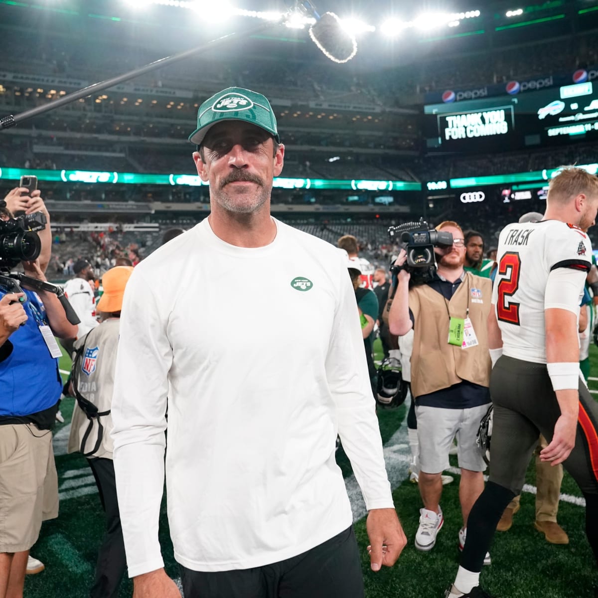 New York Jets quarterback Aaron Rodgers (8) sets up for a play during the  first half of an NFL preseason football game against the New York Giants,  Saturday, Aug. 26, 2023, in