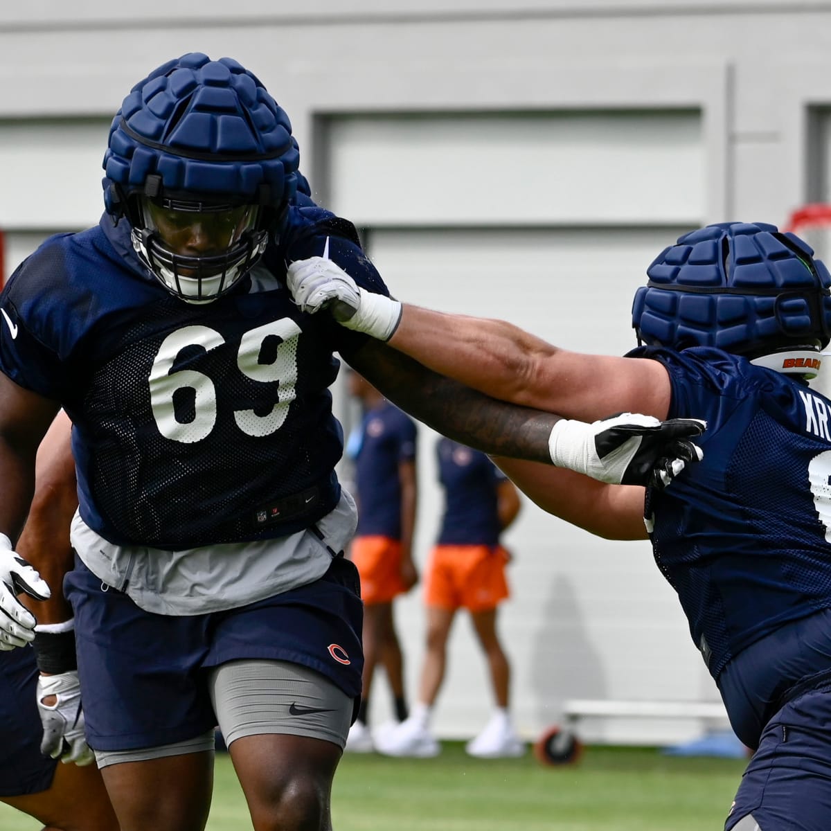 Chicago Bears guard Ja'Tyre Carter (69) looks on during the first