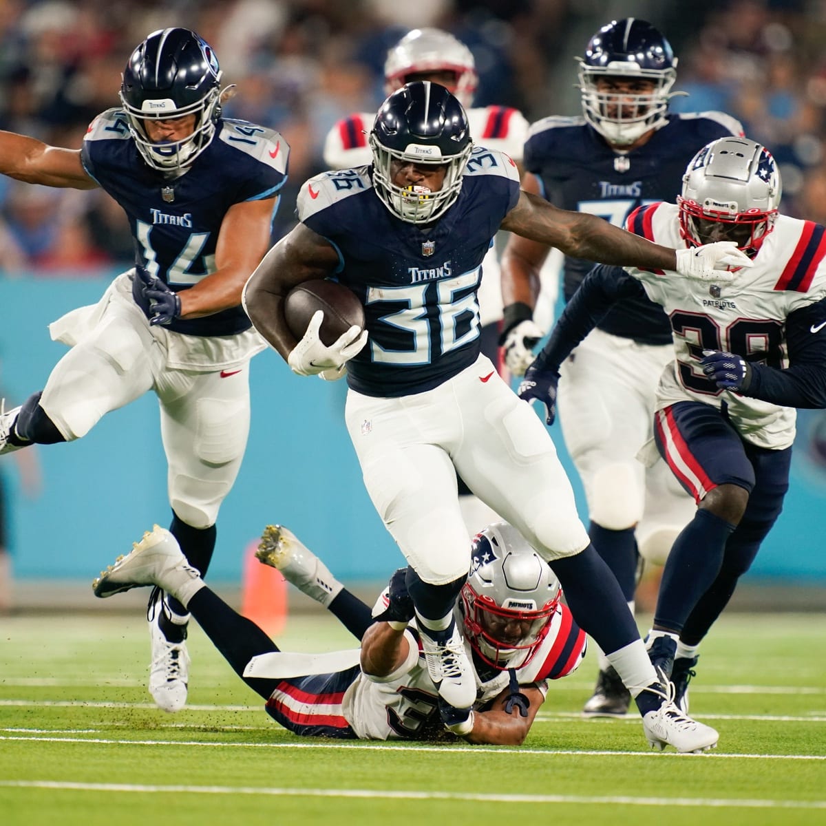 Tennessee Titans running back Julius Chestnut (36) is congratulated on his  touchdown in the first half of an NFL preseason football game against the  New England Patriots Friday, Aug. 25, 2023, in