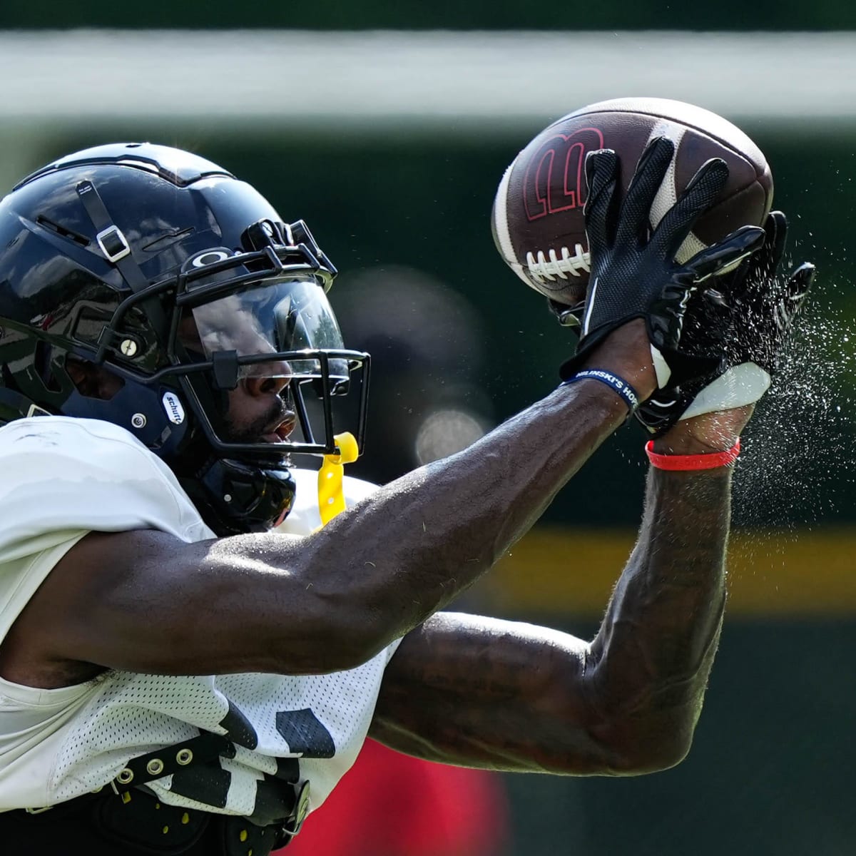 UC football releases first look of their all black Nike uniform